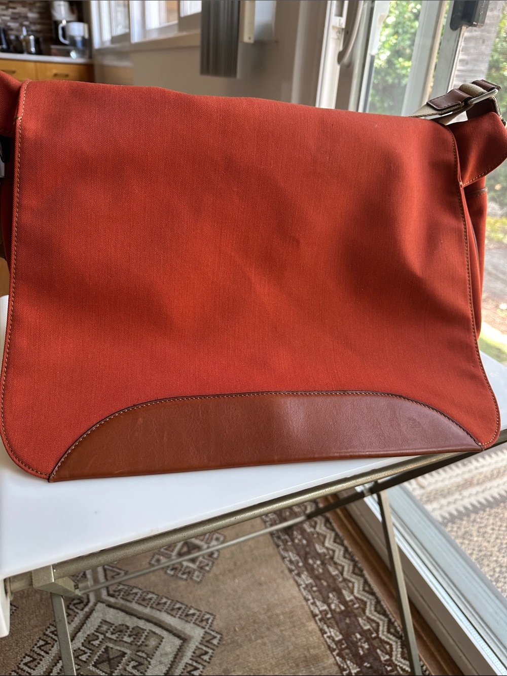 Trafalgar men’s messenger bag burnt orange with leather trim! Live New